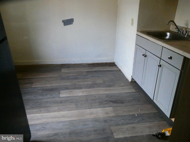 interior space with hardwood / wood-style floors and vanity