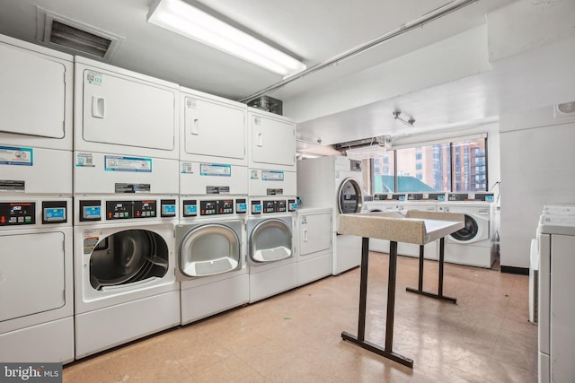 washroom with independent washer and dryer and stacked washer / drying machine