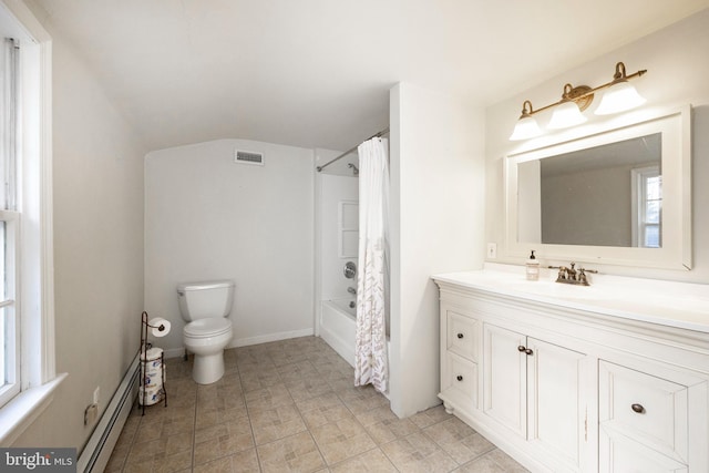 full bathroom with vanity, toilet, shower / tub combo, and a baseboard radiator