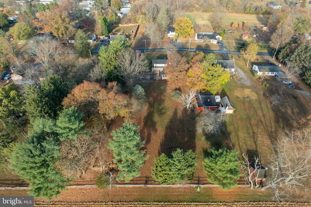 birds eye view of property with a rural view