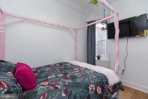 bedroom featuring hardwood / wood-style flooring