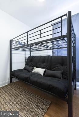 bedroom featuring hardwood / wood-style floors