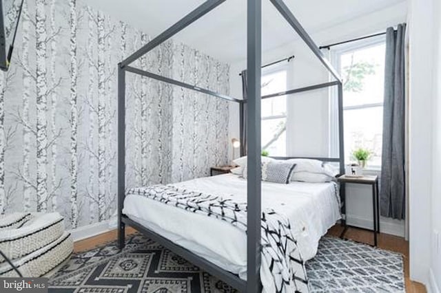 bedroom with wood-type flooring