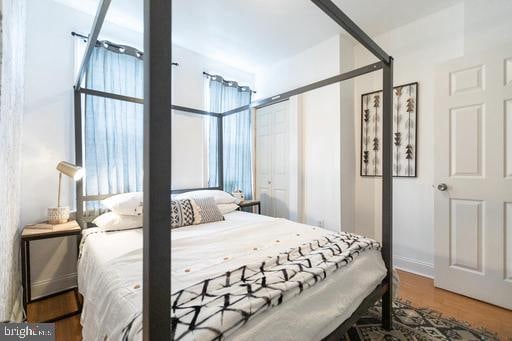 bedroom featuring hardwood / wood-style floors