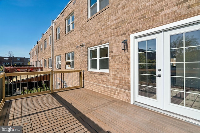 wooden terrace featuring french doors