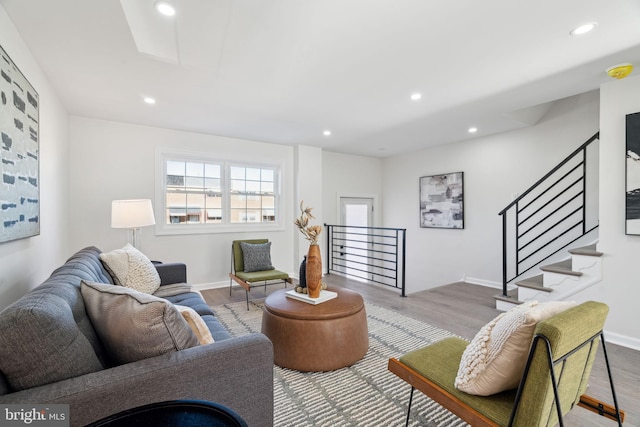 living room with light hardwood / wood-style flooring