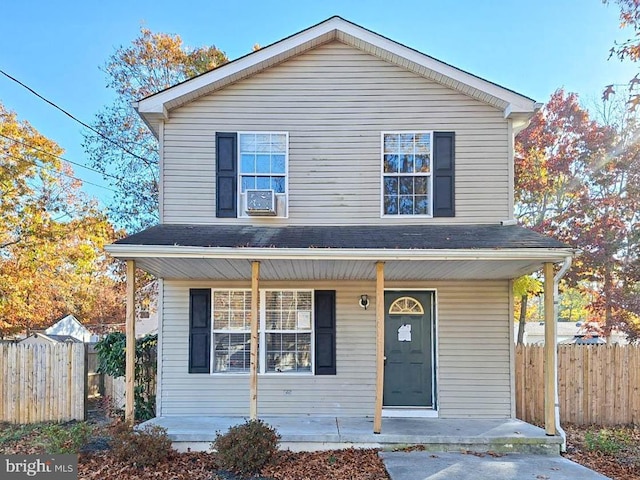 view of property featuring a porch