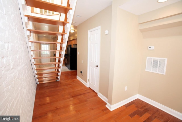 hall featuring hardwood / wood-style flooring