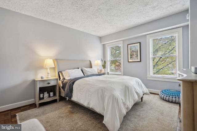 bedroom featuring a textured ceiling