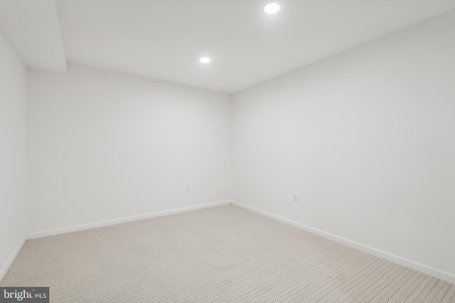 spare room featuring carpet floors