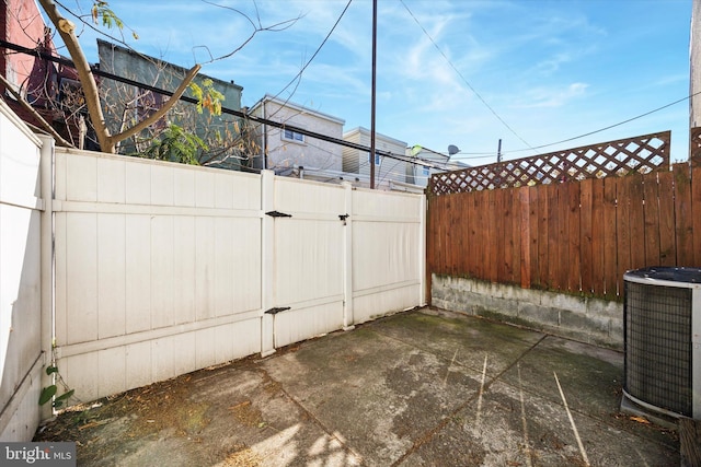 view of patio with central AC unit