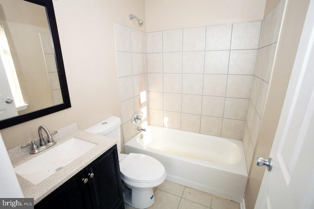 full bathroom with tile patterned flooring, vanity, toilet, and tiled shower / bath combo