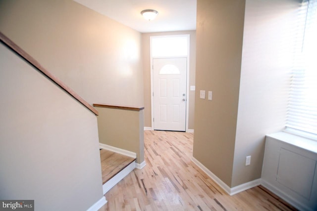 foyer with light wood-type flooring