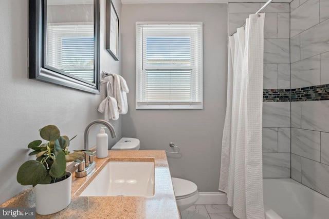 full bathroom featuring vanity, shower / bath combination with curtain, and toilet