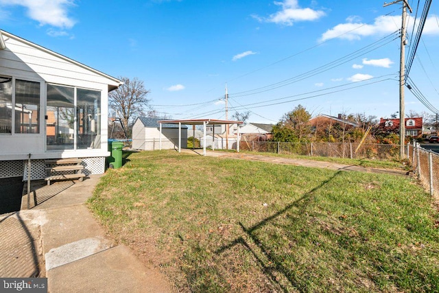 view of yard featuring a sunroom