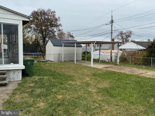 view of yard with a trampoline