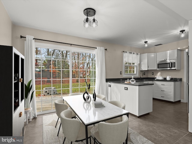 view of tiled dining space