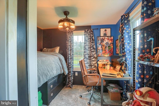 carpeted bedroom with crown molding