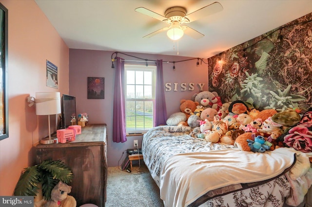 carpeted bedroom featuring ceiling fan