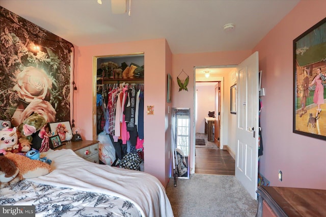 bedroom with carpet flooring and a closet