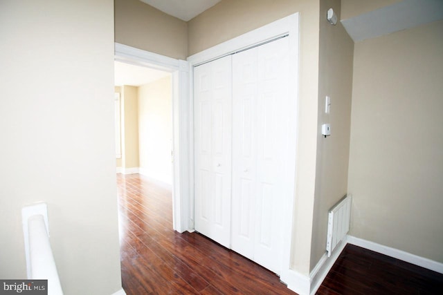 hall featuring dark hardwood / wood-style floors