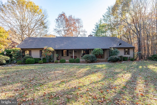 ranch-style home with a front yard