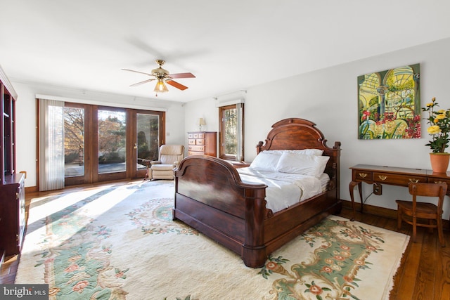 bedroom with ceiling fan and dark wood-type flooring