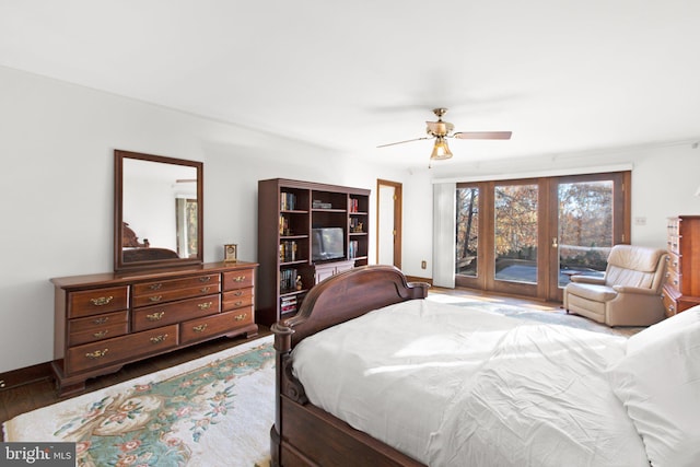 bedroom featuring ceiling fan, access to exterior, wood-type flooring, and french doors