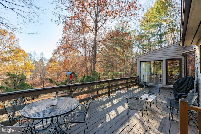 wooden deck featuring grilling area