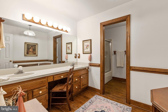 bathroom featuring shower with separate bathtub, vanity, and hardwood / wood-style flooring