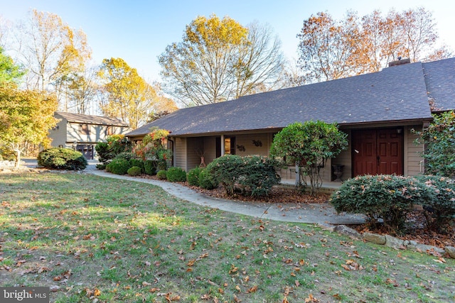 14445 Kings Grant Ln, Doswell, VA 23047 - view of front of property with a front yard, a porch, roof with shingles, and a chimney