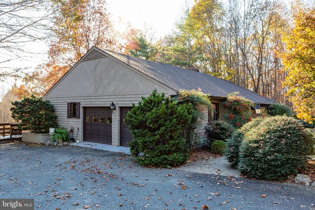 14445 Kings Grant Ln, Doswell, VA 23047 - view of property exterior featuring an attached garage