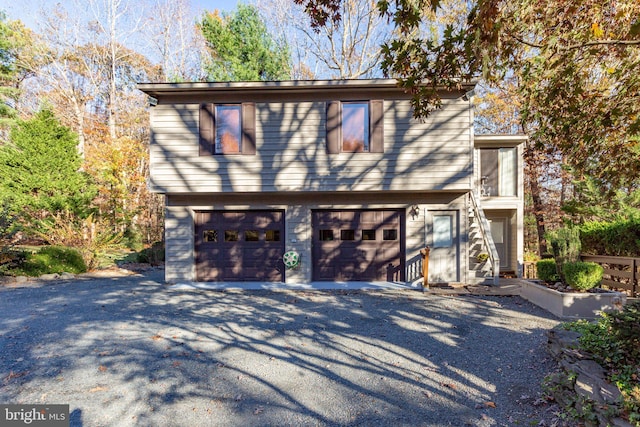 view of side of home with a garage