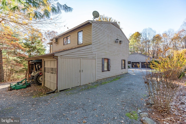 view of side of property featuring a garage