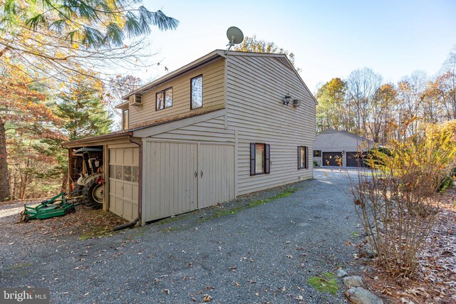 14445 Kings Grant Ln, Doswell, VA 23047 - view of property exterior with an outdoor structure