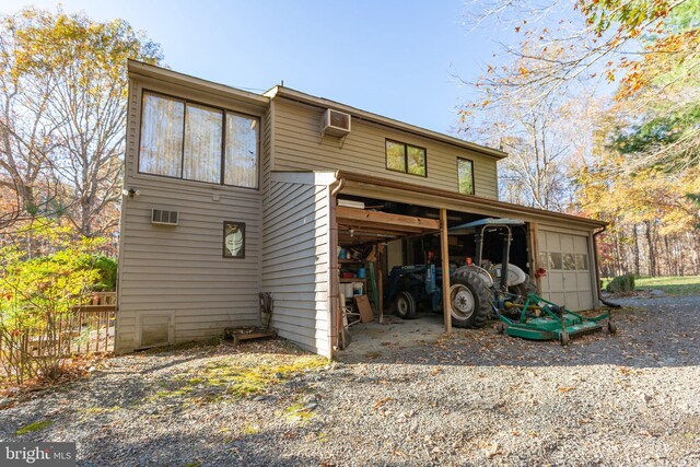 14445 Kings Grant Ln, Doswell, VA 23047 - rear view of property featuring a wall unit AC