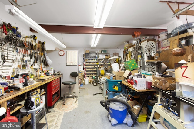 miscellaneous room with a workshop area