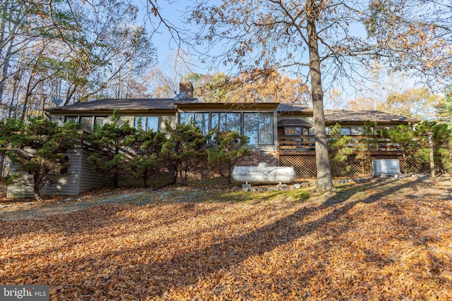 rear view of house with a deck