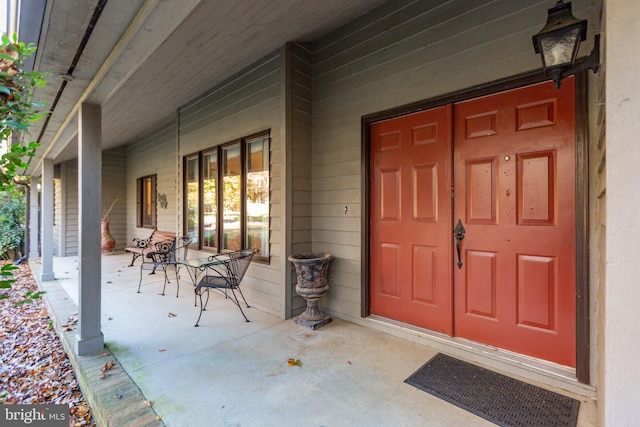 entrance to property with a porch