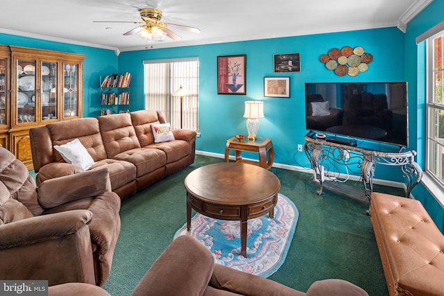 carpeted living room featuring ceiling fan and ornamental molding