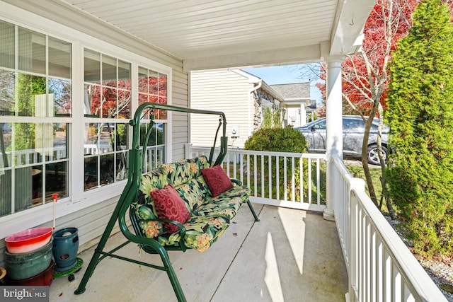 balcony featuring a porch