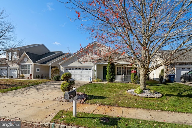 view of front facade featuring a garage and a front lawn