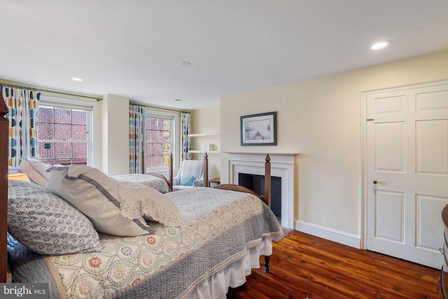 bedroom featuring dark hardwood / wood-style floors