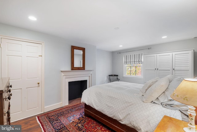 bedroom featuring dark hardwood / wood-style floors