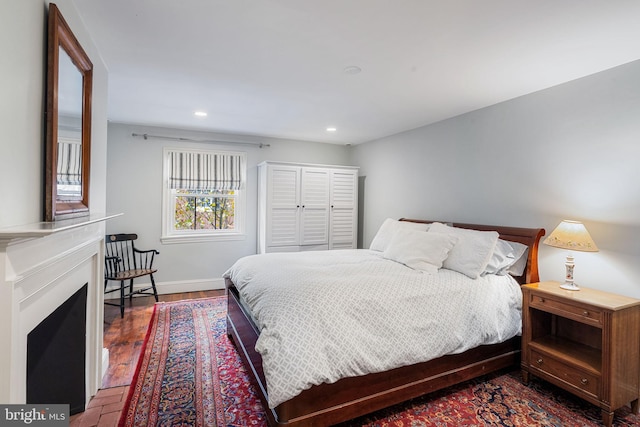 bedroom with wood-type flooring