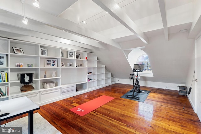 workout room featuring built in features and wood-type flooring