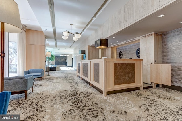 reception area with a chandelier