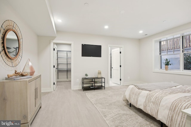 bedroom with light hardwood / wood-style flooring