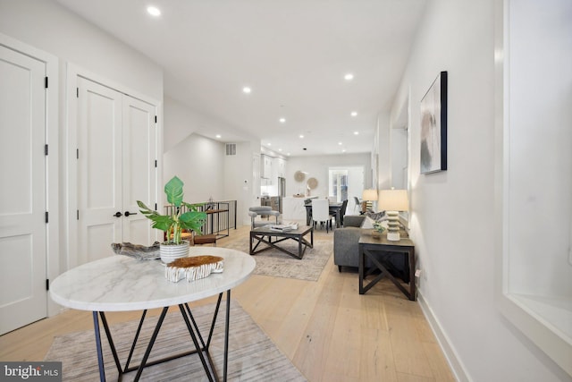 dining space featuring light hardwood / wood-style flooring