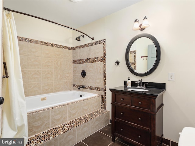 bathroom with shower / tub combo with curtain, vanity, and tile patterned flooring